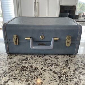 Vintage Blue Suitcase with Gold Accents